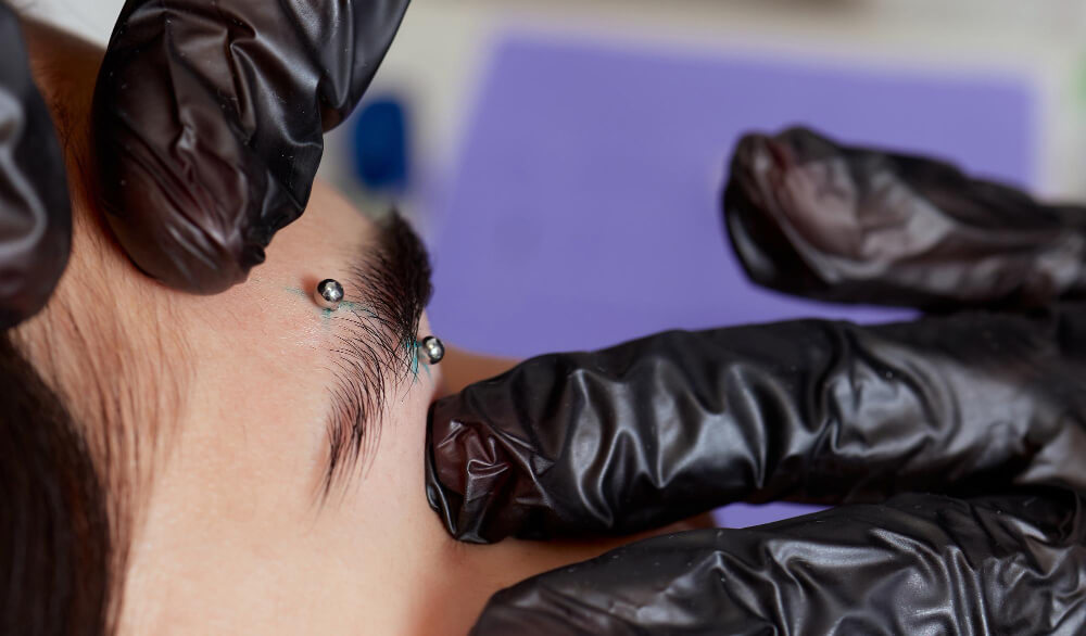 señales de infección de un piercing
